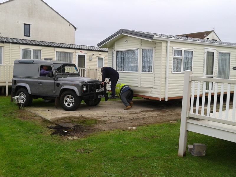 The old caravan is disconnected and moved back